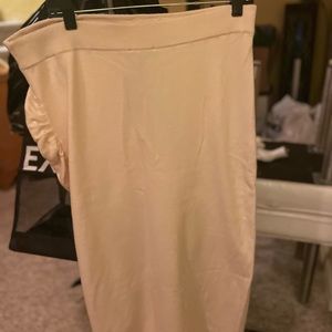 Long, cream knit skirt.